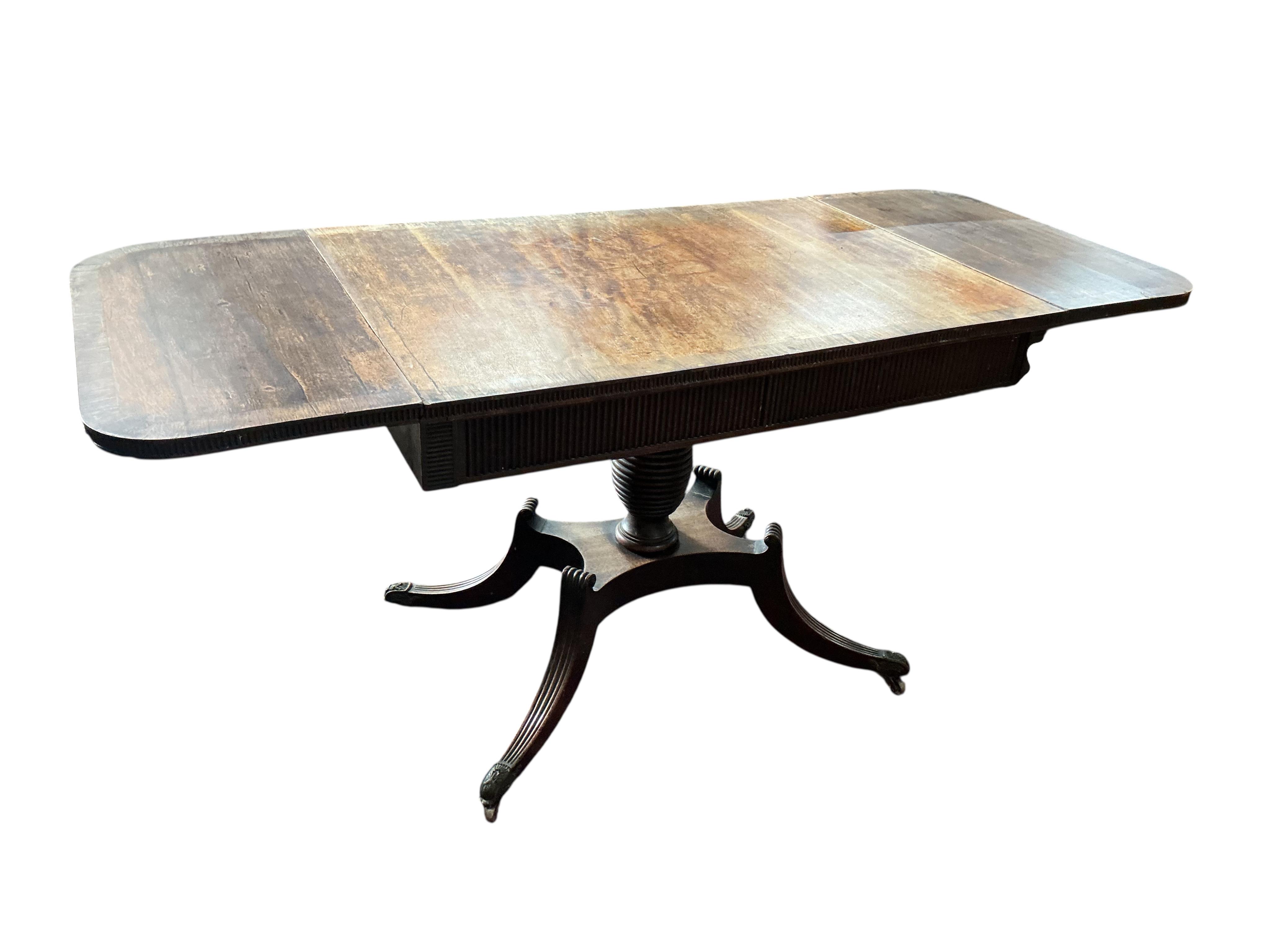 A Regency banded mahogany sofa table, width 102cm, depth 69cm, height 75cm